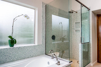 Mid-sized minimalist master green tile, blue tile, white tile and mosaic tile porcelain tile and beige floor alcove shower photo in Phoenix with shaker cabinets, light wood cabinets, an undermount tub, a one-piece toilet, beige walls, an undermount sink, quartz countertops and a hinged shower door