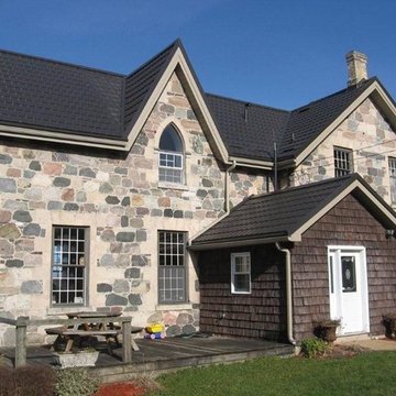 Ontario stone houses with Hy-Grade's permanent "cure" from roof shingles