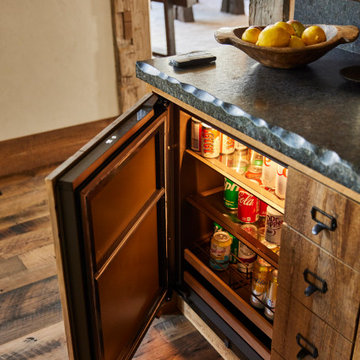 Weathered Antique Cabinetry and Antique Skip Oak Flooring in Farmhouse Home Bar