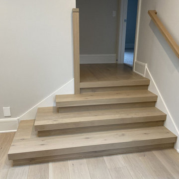 White Oak Stairs with Polished Stainless Steel Balusters