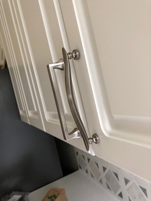 cups pulls and their matching partners in a transitional kitchenh