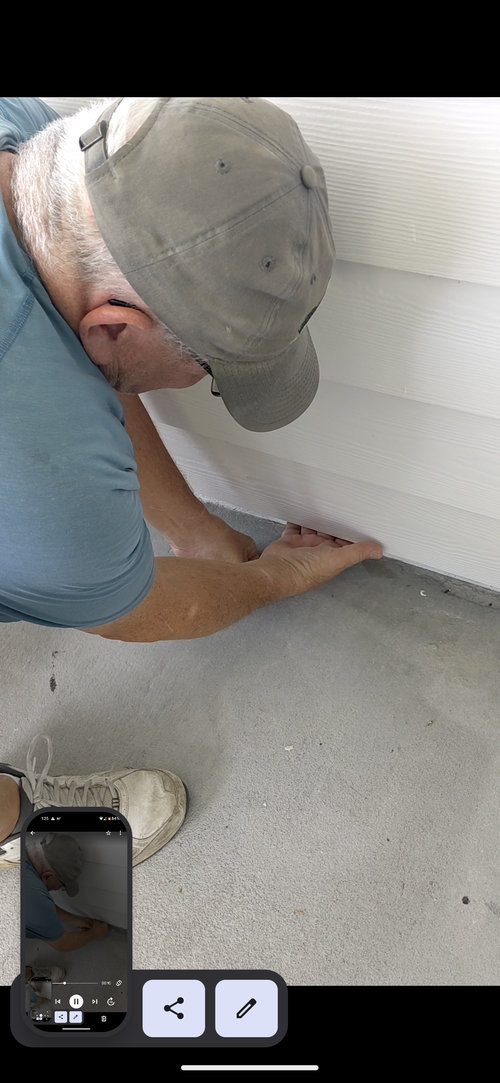 Between the hardie board and concrete block? AFTER construction...