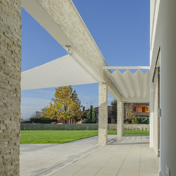 Pergola + Vela omreggiante