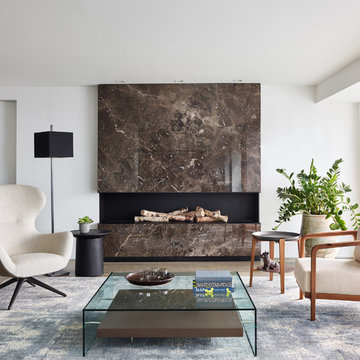 Living room with a modern stone fireplace