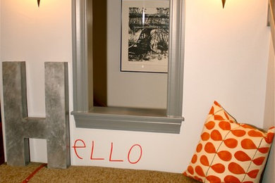 Inspiration for a small eclectic foyer remodel in Other with gray walls