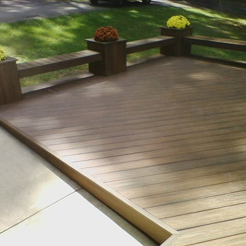 Ground level deck with planters