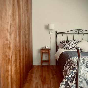 Home-made cherry panels bedroom with secret passage