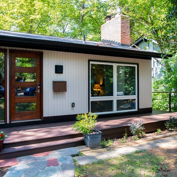 Design Builders motorized screened porch with cable railings in Bethesda, Montgo