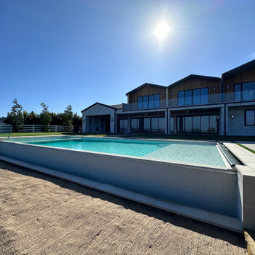 Jim Bredger Infinity edge pool and spa with atomatic cover