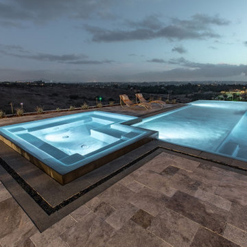 Gorgeous Infinity Pool with mulitple outdoor living spaces