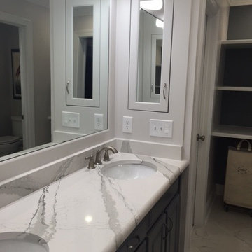 New recessed medicine cabinets. New large framed mirror