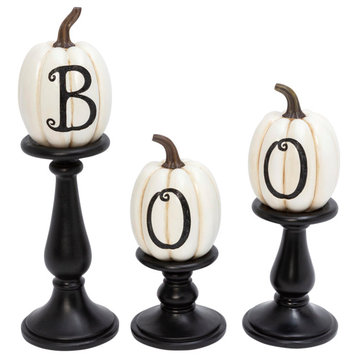 Set of three resin lettered white pumpkins on candleholders, large is 17.52-in