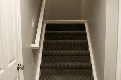 This is an example of a mid-sized transitional staircase in Indianapolis.