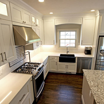 White Kitchen with Gray and Black Quartz Countertop and Bar Area ~ Streetsboro