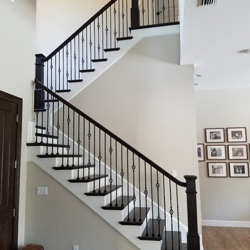 Twist & Basket Iron Balusters, Red Oak Treads & Rail