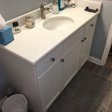 Bathtub replaced and new tile, vanity, floor.