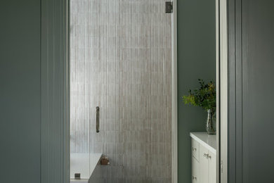 Bathroom - contemporary bathroom idea in Dallas with a hinged shower door