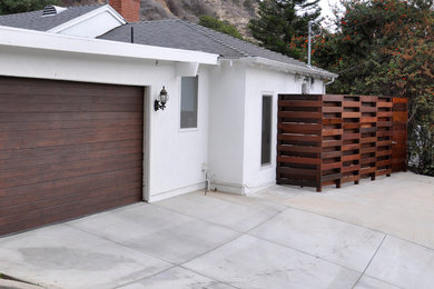 Inspiration for a mid-sized 1950s white one-story stucco exterior home remodel in Phoenix