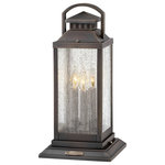 Hinkley Lighting - Revere 3-Light Pier Mount, Blackened Brass - Revere is a traditional coach lantern in solid brass with clear seedy glass panels. The glass faux candle sleeves and classic candelabra lamping complete the authentic appearance.&nbsp