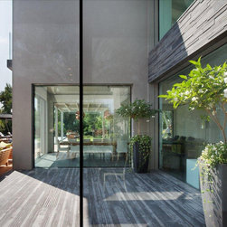 Contemporary Home with Invisible Sliders - Windows And Doors