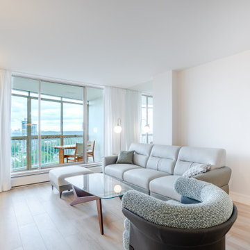 Bright Condo Living Room with Large Windows – Woodcroft Renovation, North Vancou