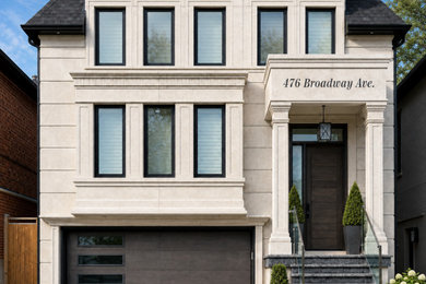 Inspiration for a large transitional beige two-story stone exterior home remodel in Toronto with a shingle roof and a black roof