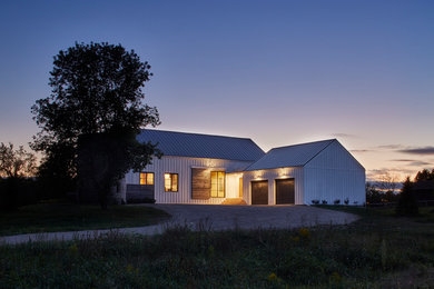 Example of a minimalist exterior home design in Other
