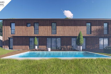 Large trendy brown two-story wood exterior home photo in Bordeaux with a tile roof