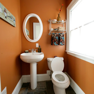 Example of a mid-sized transitional 3/4 multicolored tile and porcelain tile porcelain floor bathroom design in Boston with a pedestal sink, a two-piece toilet and orange walls