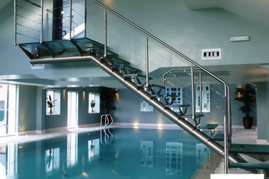 Design ideas for a large modern indoor rectangular hot tub in Other with tiled flooring.