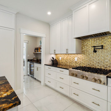 Gilded Backsplash and Custom Range Wall
