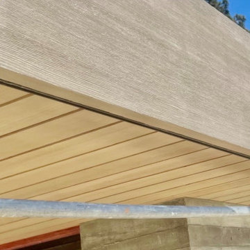 Contemporary Home with Board Formed Concrete and a Precast Cedar Fascia