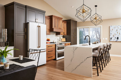 Large trendy single-wall medium tone wood floor and brown floor eat-in kitchen photo in Minneapolis with an undermount sink, flat-panel cabinets, medium tone wood cabinets, quartz countertops, white backsplash, quartz backsplash, white appliances, an island and white countertops