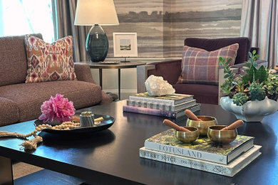 Large transitional formal and enclosed medium tone wood floor and wallpaper living room photo in Boston with purple walls, a standard fireplace and a stone fireplace