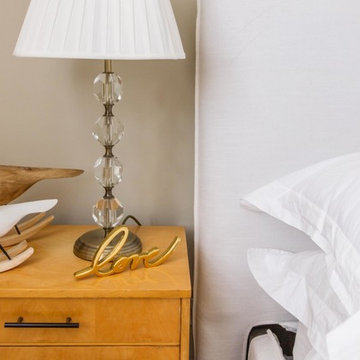 Bedside tables and white linen