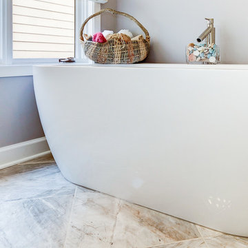 Elegant Master Bathroom Remodel with Quartz-Granite Hybrid Vanity and Spa Shower