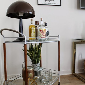 Modern Living Room with Vintage Bar Cart and Mushroom Lamp
