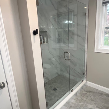 Frameless Glass Shower with Hinged Door and Modern Hardware