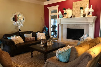 Example of a mid-sized classic formal and open concept dark wood floor and brown floor living room design in Other with red walls, a standard fireplace, a tile fireplace and no tv