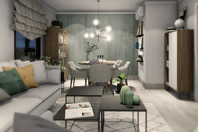 Ejemplo de salón abierto escandinavo de tamaño medio con paredes grises, suelo laminado, televisor colgado en la pared y suelo gris