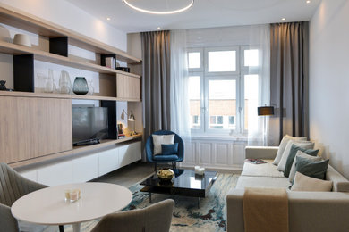 Example of a mid-sized trendy home design design in Other