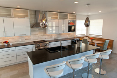 Inspiration for a modern concrete floor open concept kitchen remodel in Other with a farmhouse sink, white cabinets, quartz countertops, stainless steel appliances and an island
