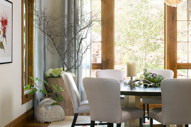 Dining room - rustic dining room idea in Denver with white walls