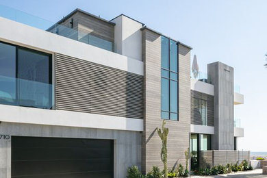 Inspiration for a contemporary two-story exterior home remodel in Orange County