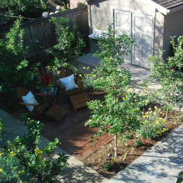 The apple grove and deck seen from above. The converted garage is hidden by the