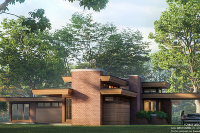Mid-sized mid-century modern brown board and batten exterior home idea in Chicago