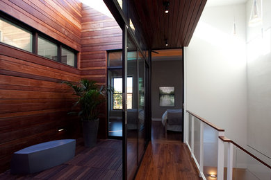 Hallway - large modern hallway idea in Chicago