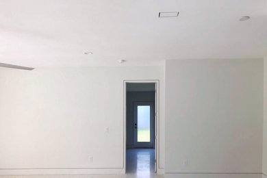 Example of a trendy home design design in Tampa