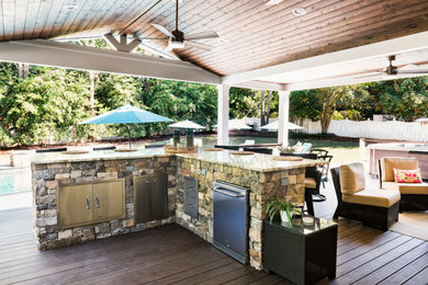 Outdoor living space with kitchen and pool
