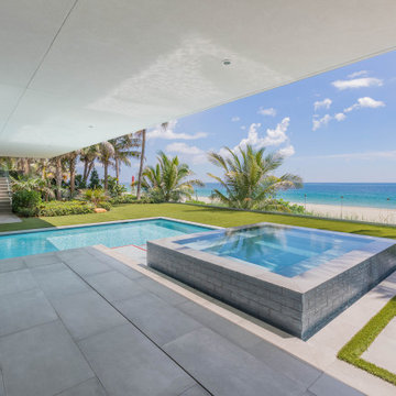 Custom Swimming Pool & Spa That Goes Underneath Part of the The House